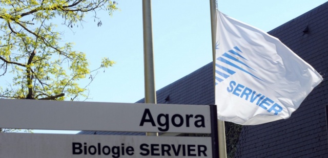 A flag bearing the logo of the French pharmaceutical giant Les Laboratoires Servier flies at half in front of the laboratory building of the group in Gily, near Orleans, following the death of the group's founder Jacques Servier. Servier, the founder of Les Laboratoires Servier, died on April 16, 2014 at the age of 92. The French French pharmaceutical group is at the centre of an ongoing trial in which the company is accused of misrepresenting a diabetes drug that may have caused up to 2,000 deaths. AFP PHOTO / GUILLAUME SOUVANT / AFP / GUILLAUME SOUVANT